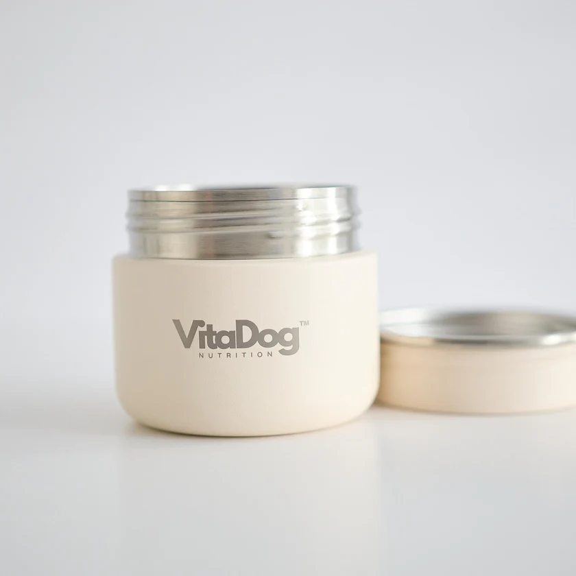 VitaDog Nutrition airless ceramic shaker jar with stainless steel screw-top lid, used to mix powder and water before serving